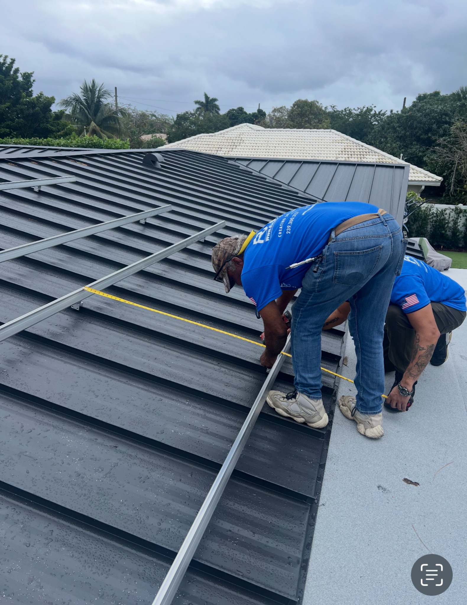 Detail work on solar rails and positioning